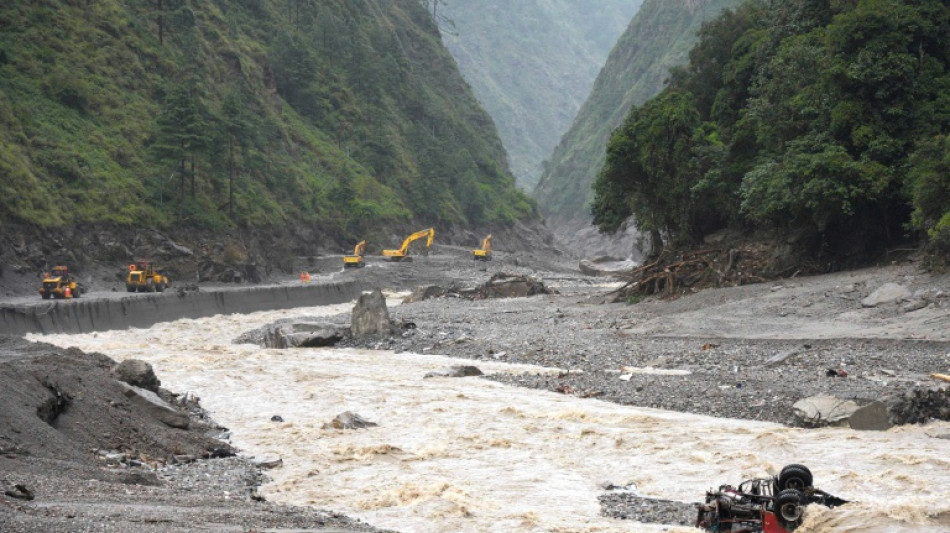 Nepal orders rescuers to safety as overflow brings new flood risks