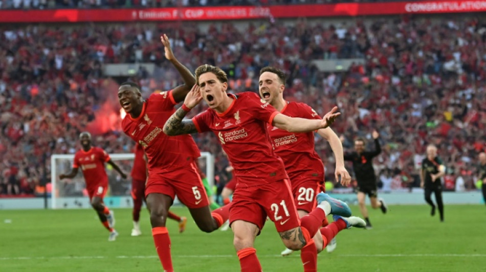 Liverpool win FA Cup final in shoot-out against Chelsea