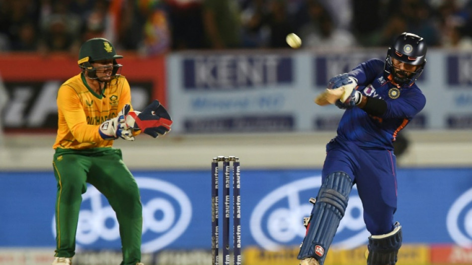 Karthik blitz guides India to 169-6 in must win T20